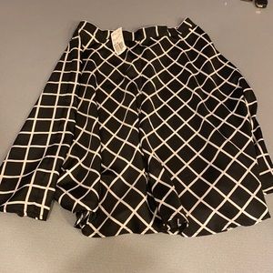 Black and white mid knee skirt. Never worn